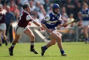 7 May 2000; James Young of Laois in action against Martin Williams of Westmeath during the Guinness Leinster Senior Hurling Championship Round Robin match between Westmeath and Laois at Cusack Park in Mullingar, Westmeath. Photo by Damien Eagers/Sportsfile