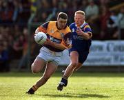 20 May 2000; Jason Lawlor of Wexford in action against Shay Nolan of Wicklow during the Bank of Ireland Leinster Senior Football Championship Group Stage Round 3 match between Wicklow and Wexford at Aughrim County Ground in Aughrim, Wicklow. Photo by Matt Browne/Sportsfile