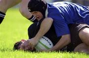 13 May 2000; Simon Mason of Ballymena is tackled by John McWeeney of St Mary's during the AIB All-Ireland League Semi-Final match between St Mary’s and Ballymena at Templeville Road in Dublin. Photo by Brendan Moran/Sportsfile