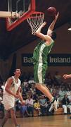 9 May 2000; Ken Lacey of Ireland scores a dunk during the International Basketball Friendly match between Ireland and Scotland at the National Basketball Arena in Tallaght, Dublin. Photo by Brendan Moran/Sportsfile