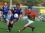7 May 2000; Kevin O'Brien of Wicklow in action against Sean Kavanagh of Carlow during the Bank of Ireland Leinster Senior Football Championship Group Stage Round 1 match between Wicklow and Carlow at the Aughrim County Ground in Aughrim, Wicklow. Photo by Matt Browne/Sportsfile