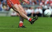 7 May 2000; A general view of a Derry player kicking a ball during the Church & General National Football League Final between Derry and Meath at Croke Park in Dublin. Photo by Brendan Moran/Sportsfile