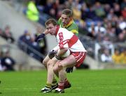 20 May 2000; Kieran McKeever of Derry in action against Trevor Giles of Meath during the Church & General National Football League Final Replay match between Derry and Meath at St Tiernach's Park in Clones, Monaghan. Photo by David Maher/Sportsfile
