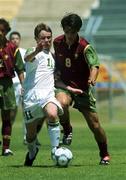 1 May 2000; Liam Kearney of Republic of Ireland in action against Custodio of Portugal during the UEFA U16 European Championship Finals match between Portugal and Republic of Ireland at Be'er Sheva Municipal Stadium in Be'er Sheva, Israel. Photo by David Maher/Sportsfile