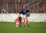 20 May 2000; Pauric Davis of Longford is consoled by team-mate Padraig Brady following their side's elimination depsite victory during the Bank of Ireland Leinster Senior Football Championship Group Stage Round 3 match between Carlow and Longford at Dr. Cullen Park, Carlow. Photo by Ray McManus/Sportsfile
