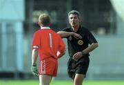 7 May 2000; Referee Michael Curley shows a yellow card to Derry goalkeeper Eoin McCloskey following the Church & General National Football League Final between Derry and Meath at Croke Park in Dublin. Photo by Brendan Moran/Sportsfile