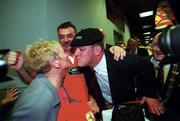 6 May 2000; Mick Galwey of Munster is greeted by supporters after arriving at Shannon Airport in Clare following his side's victory during the Heineken Cup Semi-Final match between Toulouse and Munster at the Stade du Parc Lescure in Bordeaux, France. Photo by Brendan Moran/Sportsfile