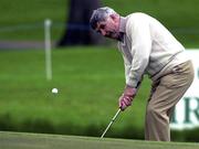 11 May 2000; Kildare manager Mick O'Dwyer plays a chip shot onto the 18th green during the AIB Irish Senior Open Pro-Am at Tulfarris Golf Club in Blessington, Wicklow. Photo by Matt Browne/Sportsfile
