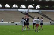 5 May 2000; Munster lock Mick Galwey practises line-outs with team-mates during a Munster Rugby squad training session at Stade du Parc Lescure in Bordeaux, France. Photo by Brendan Moran/Sportsfile