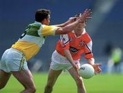 7 May 2000; Nicky Malone of Louth in action against Sean Grennan of Offaly during the Church & General National Football League Division 2 Final match between Louth and Offaly at Croke Park in Dublin. Photo by Ray McManus/Sportsfile