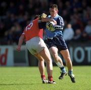 9 April 2000; Paddy Christie of Dublin in action against Colin Corkery of Cork during the Church & General National Football League Division 1A match between Dublin and Cork at Parnell Park in Dublin. Photo by Aoife Rice/Sportsfile