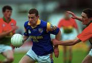 20 May 2000; Padraig Shanley of Longford in action against Stephen O'Brien of Carlow during the Bank of Ireland Leinster Senior Football Championship Group Stage Round 3 match between Carlow and Longford at Dr. Cullen Park, Carlow. Photo by Ray McManus/Sportsfile