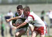 13 May 2000; Pat Ahern of Limerick in action against Gavin Devlin of Tyrone during the All-Ireland U21 Football Championship Final match between Tyrone and Limerick at Cusack Park in Mullingar, Westmeath. Photo by Ray McManus/Sportsfile