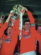 5 May 2000; Shelbourne captain Pat Scully, right, and team-mate Dessie Baker, left, lift the FAI Challenge Cup following their side's victory during the FAI Cup Final Replay match between Shelbourne and Bohemians at Dalymount Park in Dublin. Photo by Damien Eagers/Sportsfile