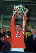 5 May 2000; Shelbourne captain Pat Scully lifts the FAI Challenge Cup following his side's victory during the FAI Cup Final Replay match between Shelbourne and Bohemians at Dalymount Park in Dublin. Photo by Damien Eagers/Sportsfile