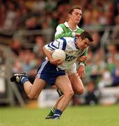 14 May 2000; Paul Finlay of Monaghan in action against Gary McBride of Fermanagh during the Bank of Ireland Ulster Senior Football Championship Preliminary Round match between Fermanagh and Monaghan at Brewster Park in Enniskillen, Fermanagh. Photo by Damien Eagers/Sportsfile