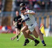 30 April 2000; Paul Flynn of Waterford in action against Cathal Moore of Galway during the Church & General National Hurling League Division 1 Semi-Final match between Galway and Waterford at Semple Stadium in Thurles, Tipperary. Photo by Damien Eagers/Sportsfile