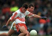 20 May 2000; Paul McFlynn of Derry in action against Richie Kealy of Meath during the Church & General National Football League Final Replay match between Derry and Meath at St Tiernach's Park in Clones, Monaghan. Photo by Aoife Rice/Sportsfile