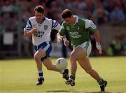 14 May 2000; Raymond Gallagher of Fermanagh in action against Noel Marron of Monaghan during the Bank of Ireland Ulster Senior Football Championship Preliminary Round match between Fermanagh and Monaghan at Brewster Park in Enniskillen, Fermanagh. Photo by Damien Eagers/Sportsfile