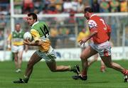 7 May 2000; Roy Malone of Offaly in action against Stephen Melia of Louth during the Church & General National Football League Division 2 Final match between Louth and Offaly at Croke Park in Dublin. Photo by Brendan Moran/Sportsfile