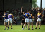 7 May 2000; Matty Forde of Wexford, second left, reacts as he is shown a red card by referee Seamus McCormack during the Bank of Ireland Leinster Senior Football Championship Group Stage Round 1 match between Wexford and Longford at O'Kennedy Park in New Ross, Wexford. Photo by Aoife Rice/Sportsfile
