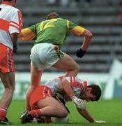 20 May 2000; Sean Lockhart of Derry in action against Trevor Giles of Meath during the Church & General National Football League Final Replay match between Derry and Meath at St Tiernach's Park in Clones, Monaghan. Photo by Aoife Rice/Sportsfile