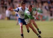 14 May 2000; Sean McDermott of Fermanagh in action against Gary McQuaid of Monaghan during the Bank of Ireland Ulster Senior Football Championship Preliminary Round match between Fermanagh and Monaghan at Brewster Park in Enniskillen, Fermanagh. Photo by Damien Eagers/Sportsfile