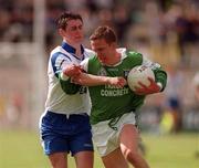 14 May 2000; Sean McDermott of Fermanagh in action against Gary McQuaid of Monaghan during the Bank of Ireland Ulster Senior Football Championship Preliminary Round match between Fermanagh and Monaghan at Brewster Park in Enniskillen, Fermanagh. Photo by Damien Eagers/Sportsfile
