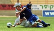 3 May 2000; Sean Thornton of Republic of Ireland in action against Georgi Mikadze of Russia during the UEFA U16 European Championship Finals match between Russia and Republic of Ireland at Be'er Sheva Municipal Stadium in Be'er Sheva, Israel. Photo by David Maher/Sportsfile