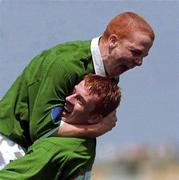 5 May 2000; Sean Thorton of Republic of Ireland, top, celebrates with team-mate Keith Graydon after scoring his side's second goal during the UEFA U16 European Championship Finals match between Republic of Ireland and England at Ashkelon Municipal Stadium in Ashkelon, Israel. Photo by David Maher/Sportsfile