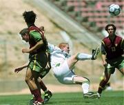 1 May 2000; Sean Thorton of Republic of Ireland in action against Portugal players, Andre, Raul, and Custodio during the UEFA U16 European Championship Finals match between Portugal and Republic of Ireland at Be'er Sheva Municipal Stadium in Be'er Sheva, Israel. Photo by David Maher/Sportsfile