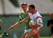 13 May 2000; Stephen O'Neill of Tyrone in action against Tommy Stack of Limerick during the All-Ireland U21 Football Championship Final match between Tyrone and Limerick at Cusack Park in Mullingar, Westmeath. Photo by Damien Eagers/Sportsfile
