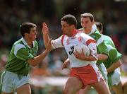 13 May 2000; Stephen O'Neill of Tyrone in action against Mark O'Riordan of Limerick during the All-Ireland U21 Football Championship Final match between Tyrone and Limerick at Cusack Park in Mullingar, Westmeath. Photo by Damien Eagers/Sportsfile
