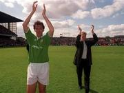 21 May 2000; Tony Cascarino, left, and Steve Staunton applaud the crowd following their Testimonial match between Republic of Ireland XI and Liverpool at Lansdowne Road in Dublin. Photo by Brendan Moran/Sportsfile