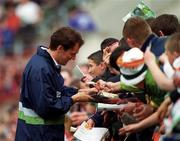 21 May 2000; Tony Cascarino signs autographs for supporters prior to the Steve Staunton and Tony Cascarino Testimonial match between Republic of Ireland XI and Liverpool at Lansdowne Road in Dublin. Photo by Damien Eagers/Sportsfile