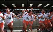 13 May 2000; Tyrone players, from left, Declan McCrossan, Kevin O'Brien and Brendan Donnelly celebrate at the final whistle following their side's victory during the All-Ireland U21 Football Championship Final match between Tyrone and Limerick at Cusack Park in Mullingar, Westmeath. Photo by Damien Eagers/Sportsfile
