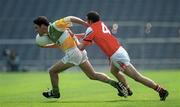 7 May 2000; Vinny Claffey of Offaly in action against Brendan Reilly of Louth during the Church & General National Football League Division 2 Final match between Louth and Offaly at Croke Park in Dublin. Photo by Brendan Moran/Sportsfile