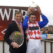 12 April 2004; Trainer Ferdy Murphy, left, and jockey Brian Harding celebrate after sending out Granit D'Estruval to win the Powers Gold Label Irish Grand National Handicap Steeplechase at Fairyhouse Racecourse in Ratoath, Meath. Photo by Damien Eagers/Sportsfile