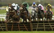 12 April 2004; Al Towd, right, with David Boland up, jumps the last ahead of eventual second place Well Presented, with Barry Geraghty up, on their way to winning the Leinster Petroleum Handicap Hurdle at Fairyhouse Racecourse in Ratoath, Meath. Photo by Brian Lawless/Sportsfile