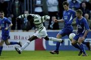 12 April 2004; Mark Rutherford of Shamrock Rovers in action against Daryl Murphy, centre, and Alan Reynolds of Waterford United during the Eircom League Premier Division match between Shamrock Rovers and Waterford United at Richmond Park in Dublin. Photo by Brendan Moran/Sportsfile