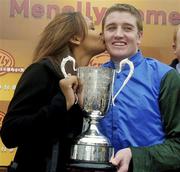 13 April 2004; Jockey Barry Geraghty gets a kiss from singer Samantha Mumba after riding Macs Joy to victory in the Menolly Homes Handicap Hurdle at Fairyhouse Racecourse in Ratoath, Meath. Photo by Damien Eagers/Sportsfile