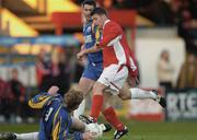 16 April 2004; Wes Hoolahan of Shelbourne in action against Stephen Paisley of Longford Town during the Eircom League Premier Division match Shelbourne and Longford Town at Tolka Park in Dublin. Photo by Damien Eagers/Sportsfile