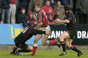16 April 2004; Shaun Payne of Munster in action against Hugo Southwell, left, and Simon Webster of Edinburgh during the Celtic League match between Munster and Edinburgh at Musgrave Park in Cork. Photo by Brendan Moran/Sportsfile