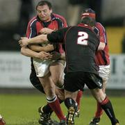 16 April 2004; Rob Henderson of Munster is tackled by Andrew Kelly of Edinburgh during the Celtic League match between Munster and Edinburgh at Musgrave Park in Cork. Photo by Brendan Moran/Sportsfile