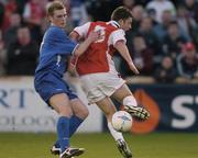 16 April 2004; Jimmy Lee Jones of St Patrick's Athletic in action against Mark Clifford of Waterford United during the Eircom League Premier Division match between St Patrick's Athletic and Waterford United at Richmond Park in Dublin. Photo by Pat Murphy/Sportsfile