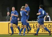 16 April 2004; Vinny Sullivan of Waterford celebrates with team-mates Kevin O'Brien, 2, Daryl Murphy, right, after scoring his side's first goal during the Eircom League Premier Division match between St Patrick's Athletic and Waterford United at Richmond Park in Dublin. Photo by Pat Murphy/Sportsfile
