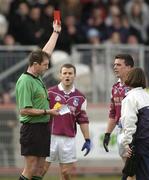 18 April 2004; Referee Michael Monahan shows the red card to Padraig Joyce of Galway, right, during the Allianz National Football League Division 1 Semi-Final match between Tyrone and Galway at Healy Park in Omagh, Tyrone. Photo by Damien Eagers/Sportsfile