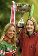 20 April 2004; The captains from Mayo and Cork came face to face in Dublin today ahead of their clash in the Suzuki Ladies National Football League Final. Pictured during a photocall are Mayo captain Nuala O'Shea, left, and Cork captain Juliette Murphy, at St Stephens Green in Dublin. Photo by Damien Eagers/Sportsfile