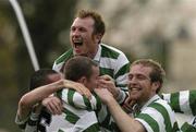 23 April 2004; Mark O' Brien of Shamrock Rovers, hidden, celebrates with team-mates Trevor Molloy, Stephen Gough, and Paul Caffrey after scoring his side's first goal during the Eircom League Premier Division match between Shamrock Rovers and St Patrick's Athletic at Richmond Park in Dublin. Photo by David Maher/Sportsfile