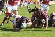25 April 2004; Anthony Foley of Munster dives over to score a try during the Heineken Cup Semi-Final match between Munster and London Wasps at Lansdowne Road in Dublin. Photo by Matt Browne/Sportsfile